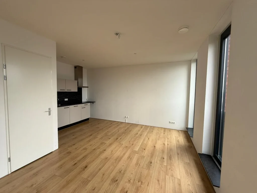 Woonkamer en keuken van appartement 37J in Dongen